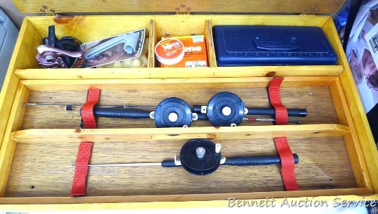 Handy wooden ice fishing box holds ice fishing poles, reels, fishing line, more. Box is about 30" x