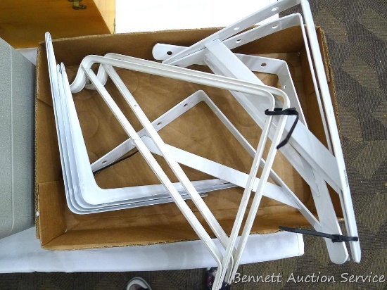 Several shelf brackets, measure about 9" x 12". Two closet angle brackets.