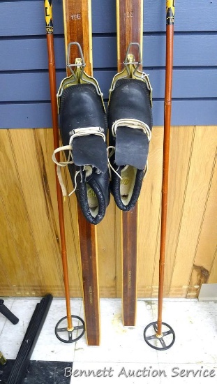 Bonna wooden skis model 2400 with 3 pin bindings include 52" cane poles and Alfa boots, size 40. All