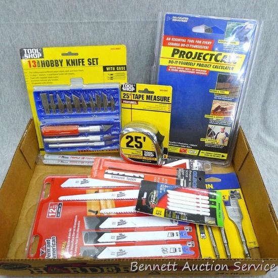 Sawzall blades, metal wood bits, Tool Shop 13 piece hobby knife set, Tool Shop 25' tape measure, and