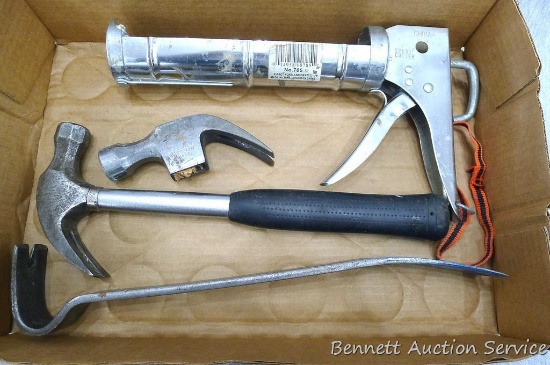 Claw hammer, claw hammer head, with a pry bar; measures 14-1/2" and a calking gun.