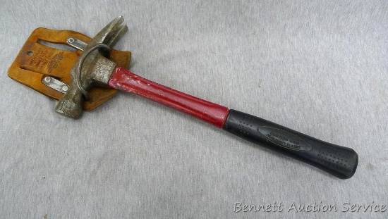 18 oz. carpenter's claw hammer with fiberglass handle and belt holder; hammer measures 15".
