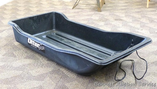 Otter brand ice fishing sled is about 25" x 54" x 8". Looks to be in good condition.