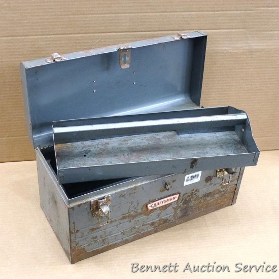 Metal Craftsman tool box has a removable tray and stands approx 18" x 8" x 9" tall. Rust noted but