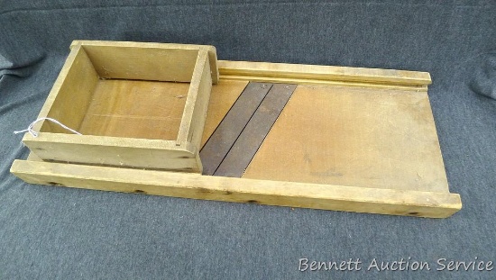 Tee-Dee wooden kraut cutter is marked 672-W and T&D MFG Co. INDPLS, USA. Measures about 2' x 9" x 4"