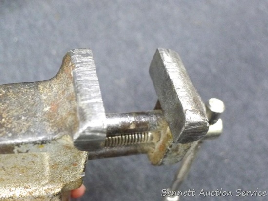 Miniature clamp-on bench vise has 1-1/2" jaws.