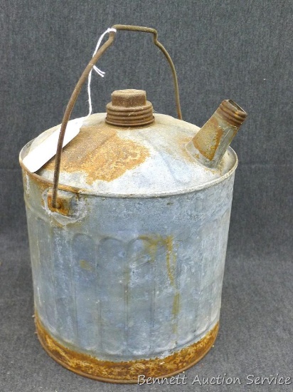 Old galvanized coal oil can stands 13" with handle.