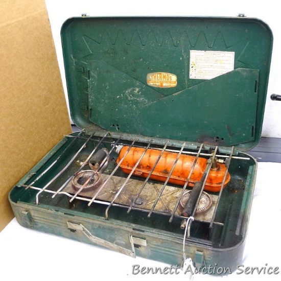Thermos 2 burner white gas camp stove is 22" x 12" x 4" tall.