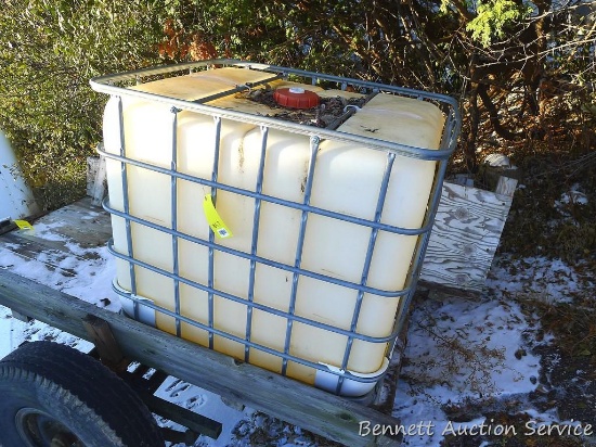 Caged poly tote is 48" x 39" x 46" tall. Tote comes with a cap and valve, cage is in good condition.
