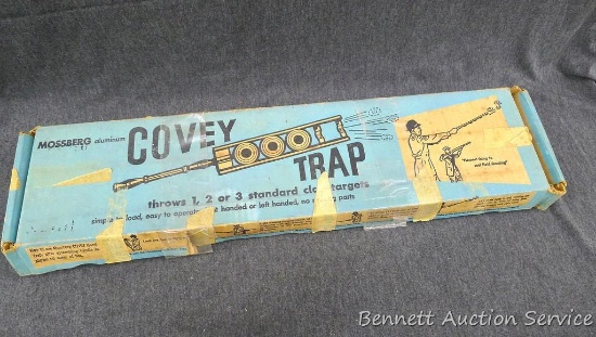 Mossberg aluminum model C-1 Covey trap thrower comes with box and operators manual. Measures about