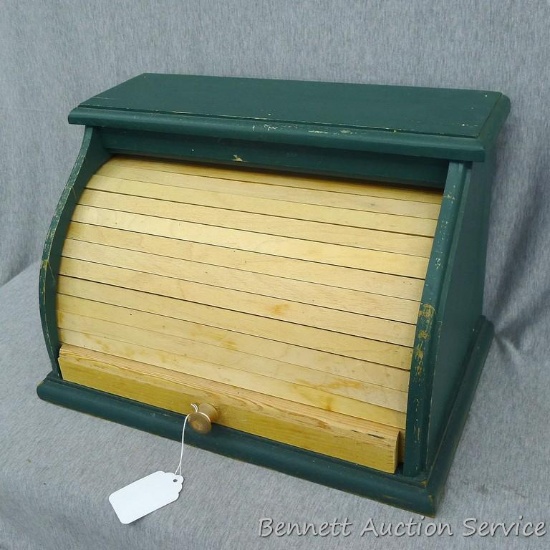Tambour bread box or appliance garage is a foot and a half wide. Solid wood and press board