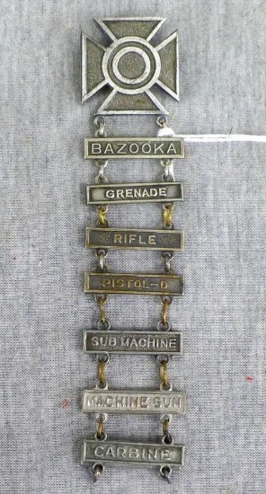 US Army Marksmanship Sharpshooter Qualification Badge with several clasps including Bazooka, Sub