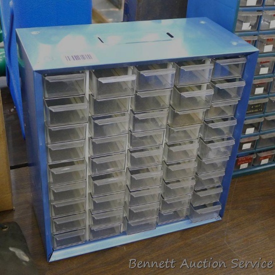 Steel bodied drawer organizer is approx. 14" x 13". One drawer lip is cracked.