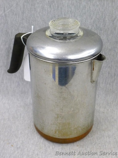 RevereWare copper clad stainless steel coffee pot is in good shape. Stands 9" tall.