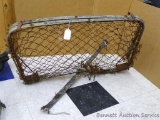 Spring loaded clam-style beaver trap is 38