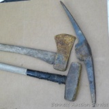 Single bit ax, pic ax head, and a sledge hammer. Sledge hammer head is 8