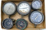 Seven steam punk gauges would make a neat project, largest is about 7