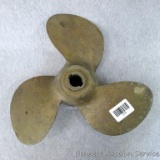 Three blade brass boat motor prop is about 12