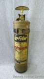 Brass Fry-Fyter Model A vintage fire extinguisher with mounting bracket. Measures approx 14