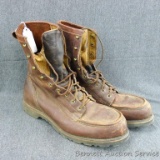 Filson leather high top work boots are size 13D with Vibram soles and show wear.