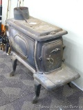 Cast iron wood stove is about 13