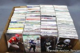 Collection of unsorted football cards.