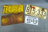 Wisconsin, Minnesota, and South Dakota license plated dating back to 1935. 3 largest measure approx