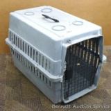 Pet carrier/ kennel is about 26-1/2