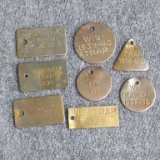 Wisconsin trap tags 1927, 1929, 1931, 1935 through 1939.