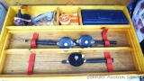 Handy wooden ice fishing box holds ice fishing poles, reels, fishing line, more. Box is about 30