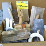 Sheetrock mud tools; includes trowels, brushes, sanding screens, tape, and more.