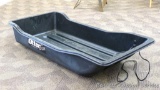 Otter brand ice fishing sled is about 25