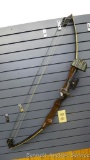 Magnesium handled compound bow with laminated limbs is 51