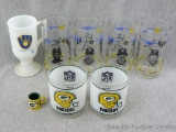 Green Bay Packers and Milwaukee Brewers glasses and mug. Look to be in good condition. Packers