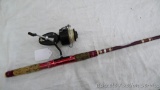 Garcia Mitchell 300 fishing reel is mounted on a Berkley Cherrywood rod. Eyes look to be in good