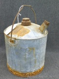 Old galvanized coal oil can stands 13