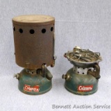 2 Coleman one burner camp stoves, model 502. One includes a heat shield. If shipped, we will dispose