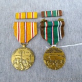 Two WWII metals with ribbon and bar pins. Green ribboned metal is marked 'European African Middle