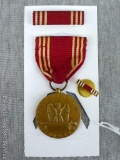 WWII US Military red and white ribboned metal is marked 'Efficiency Honor Fidelity', back 'For Good