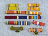 US Navy ribbons incl. Sea Service Deployment, 'E' ribbon, and Good Conduct. US Army ribbons