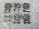 US Army Marksmanship Qualification Badges. Three Marksman badges, two with Rifle clasps, one with