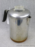 RevereWare copper clad stainless steel coffee pot is in good shape. Stands 9