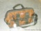 Bucket Boss canvas tool bag has inner and outer pockets, zipper works. Also has handles and strap;