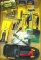 Milwaukee utility knife with pouch; Zircon stud finder; DeWalt and other assorted drivers; drill