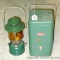 Coleman twin mantle white gas lantern Model 220E, date coded 1961. Globe is amber tinted. Comes with
