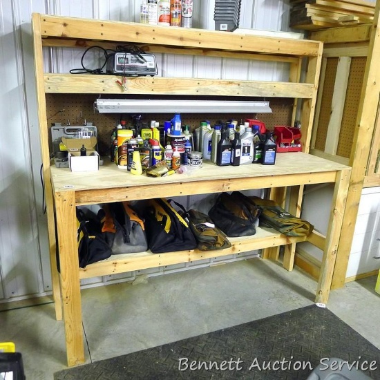 Nicely made homemade wooden work bench is sturdy and measures 72" x 30" x 72" tall. Has three