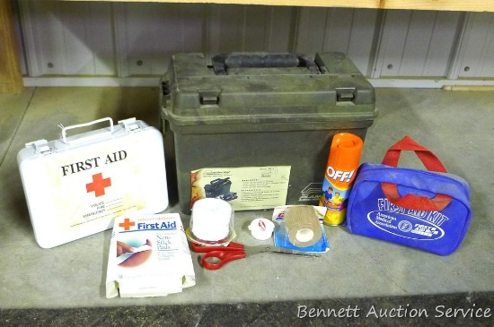 Plastic tote with First Aid Kits with bandages, bug spray and more, 16" x 8" x 9".