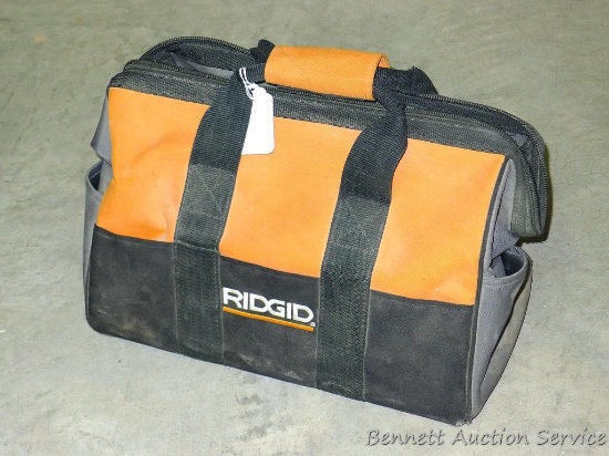 Ridgid tool bag has inner and outer pockets, 8" x 18" x 12". Zipper works good.