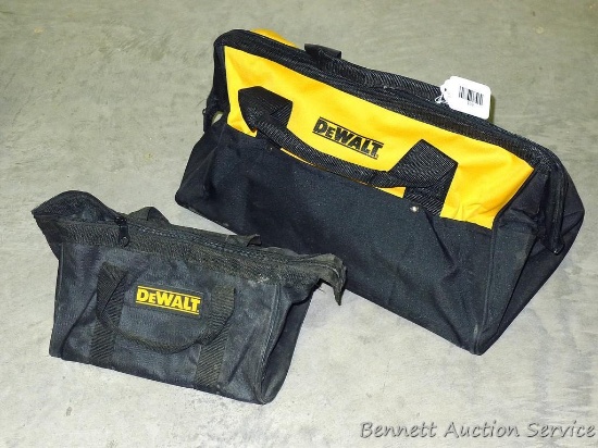 Two De Walt tool bags with pouches inside and out. Largest is 20" x 11" x 12".