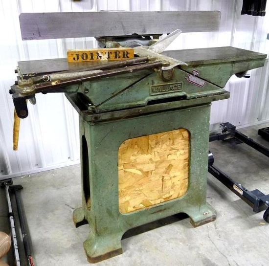 Wallace cast iron 8" jointer with an extra set of blades. Guard made by Surety Guard Co. Chicago.